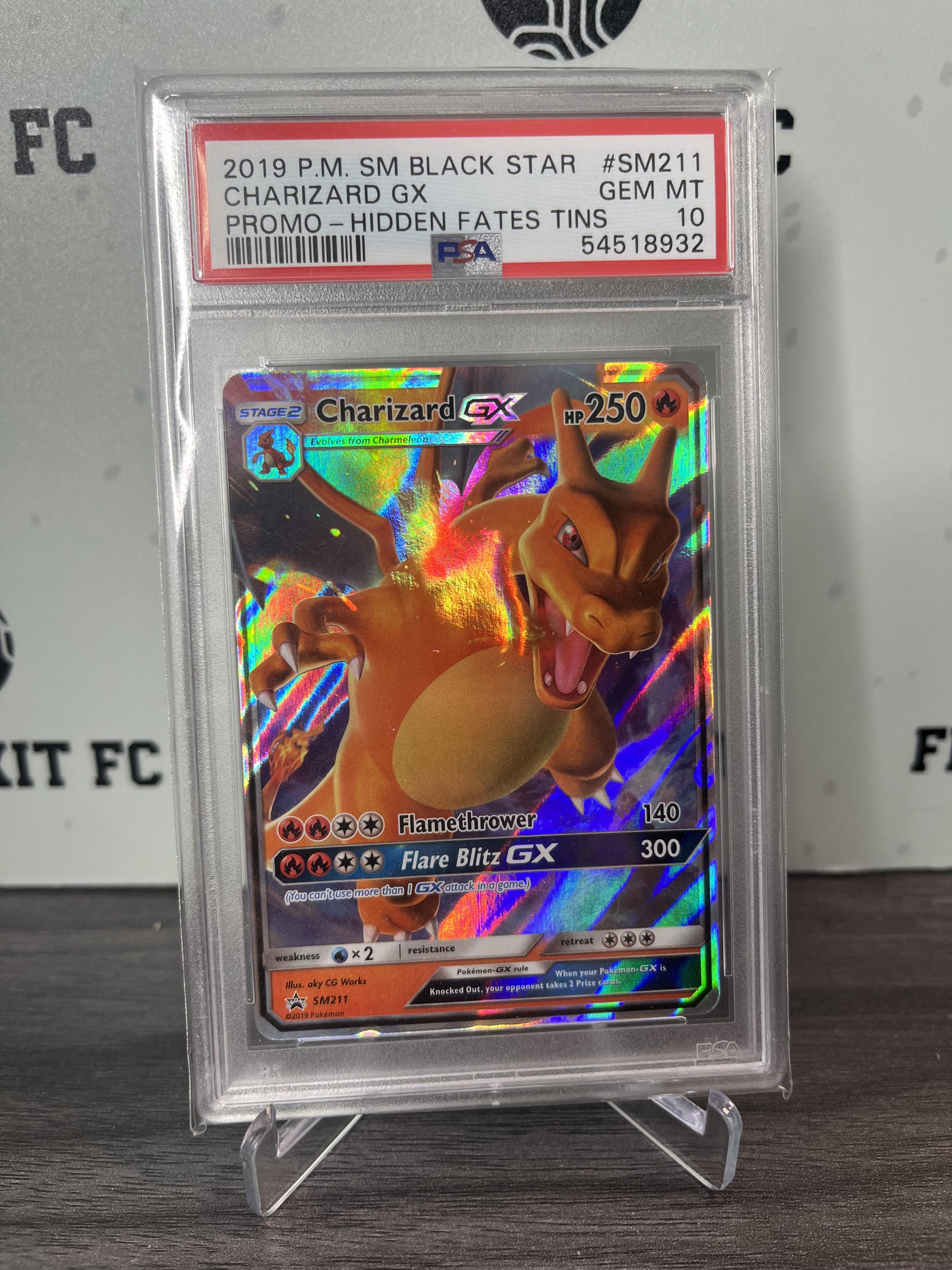 Pokemon Black Star Promo Charizard Gx #SM211 (PSA 10 Grade)